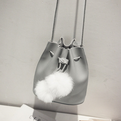 Γυναικεία τσάντα με μακριά λαβή σε δύο χρώματα