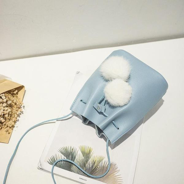 Γυναικεία τσάντα με μακριά λαβή σε δύο χρώματα