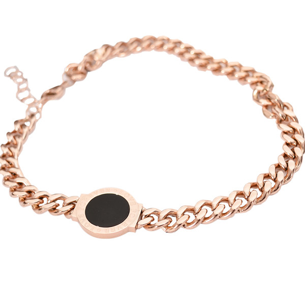 Elegáns női karkötő fekete kővel és arany színű feliratokkal