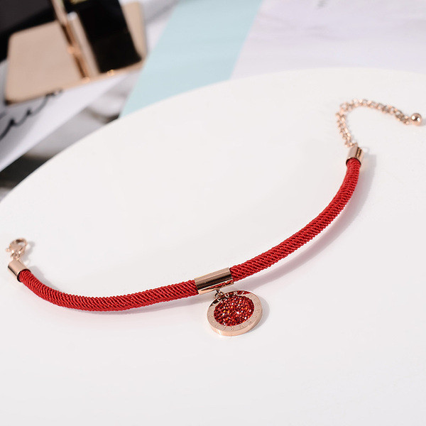 Női mindennapi karkötő piros medállal