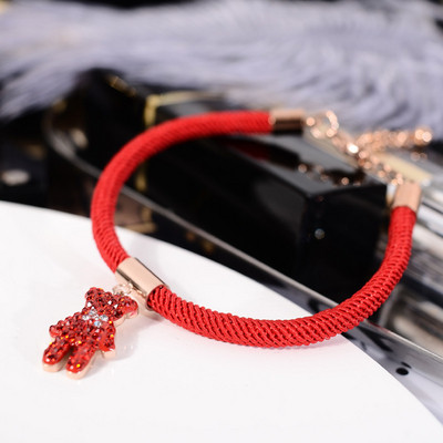 Γυναικείο βραχιόλι με κόκκινο χρώμα με κρεμαστό κόσμημα - δύο μοντέλα