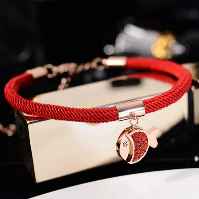 Γυναικείο βραχιόλι με κόκκινο χρώμα με κρεμαστό κόσμημα - δύο μοντέλα