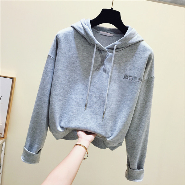 Sport-alkalmi női blúz kapucnival két színben