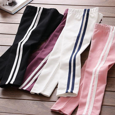 Children`s sports leggings with a ribbon in several colors