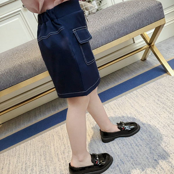 Stílusos gyerekszoknya cipzárral és zsebekkel