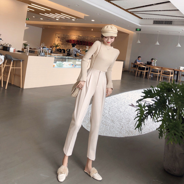 Stílusos női nadrág magas derékkal, fekete-fehér színben