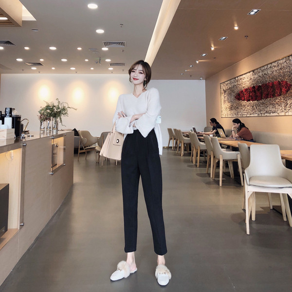 Stílusos női nadrág magas derékkal, fekete-fehér színben