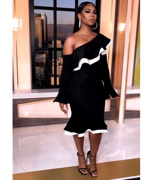 Rochie modernă de damă în alb-negru cu mâneci lotus