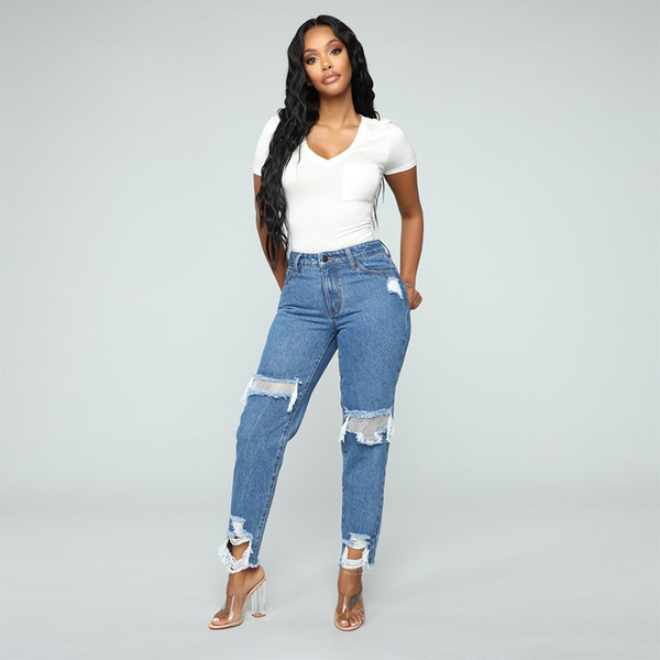 Μοντέρνα γυναικεία τζιν με ψηλή μέση και σκισμένα μοτίβα