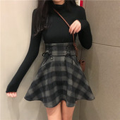 Modern női szoknya magas derékkal és nyakkendővel