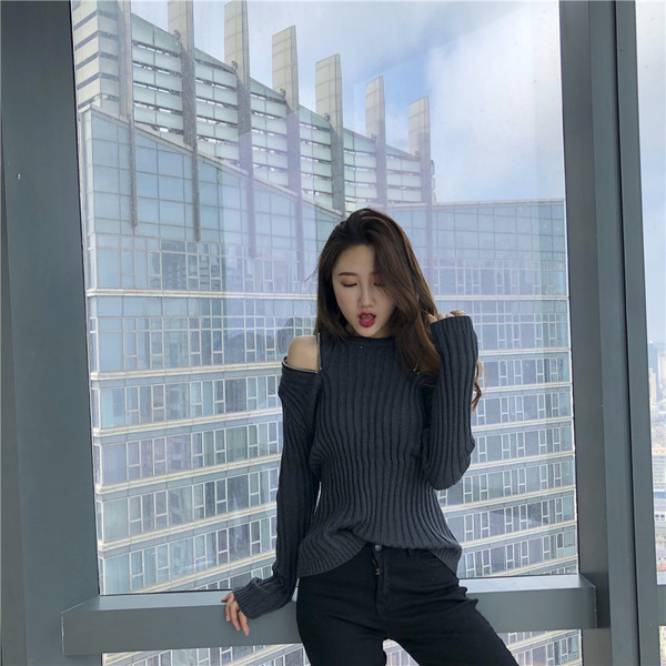 Lezser női blúz vállán cipzárral