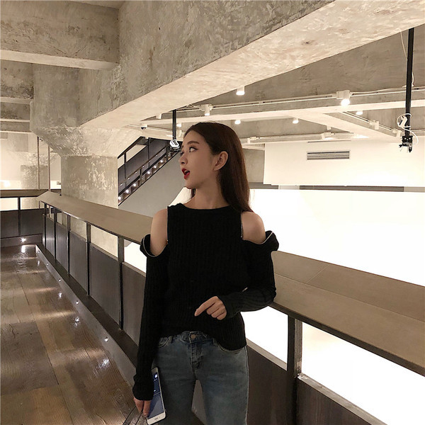 Lezser női blúz vállán cipzárral