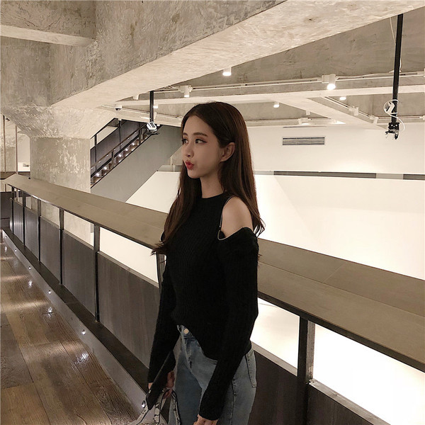 Lezser női blúz vállán cipzárral