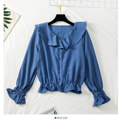 Modern női ing gumival az ujjakon