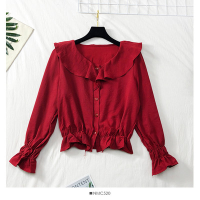 Modern női ing gumival az ujjakon