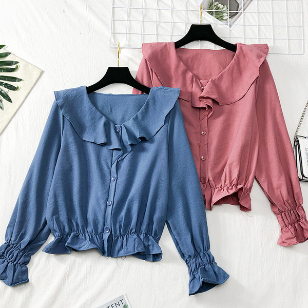 Modern női ing gumival az ujjakon