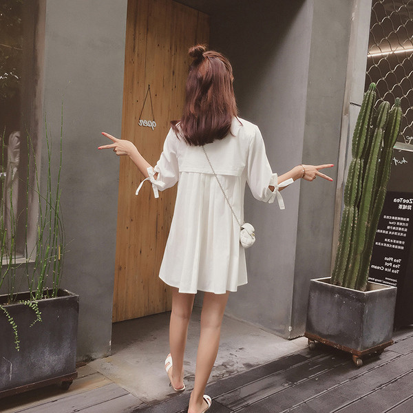 Elegáns női ing szabású modell 3/4 ujjú fehér színben