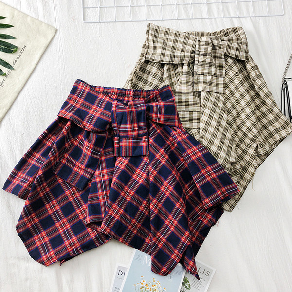 Aktuális női kockás szoknya különböző színekben