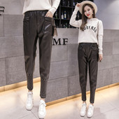 Modern női nadrág eko bőrből, rugalmas derékkal, fekete színben