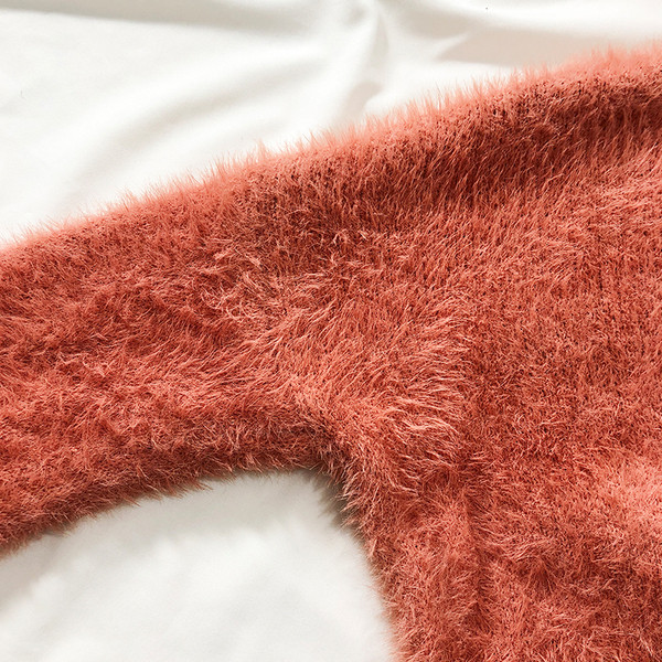 Modern női pehelypulóver több színben