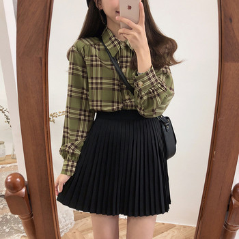 Modern rakott női szoknya fehér, fekete és krém színben