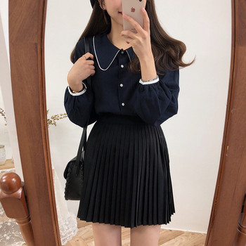 Modern rakott női szoknya fehér, fekete és krém színben