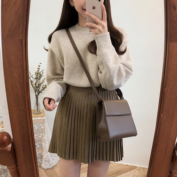 Modern rakott női szoknya fehér, fekete és krém színben