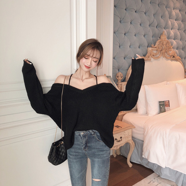 Vastag női blúz ejtett ujjakkal, fekete színben