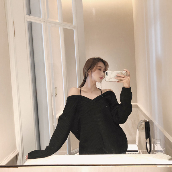 Vastag női blúz ejtett ujjakkal, fekete színben