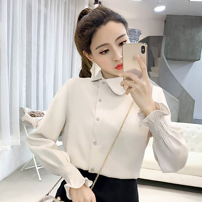 Elegáns női ing oldalsó rögzítéssel, kék és fehér színben