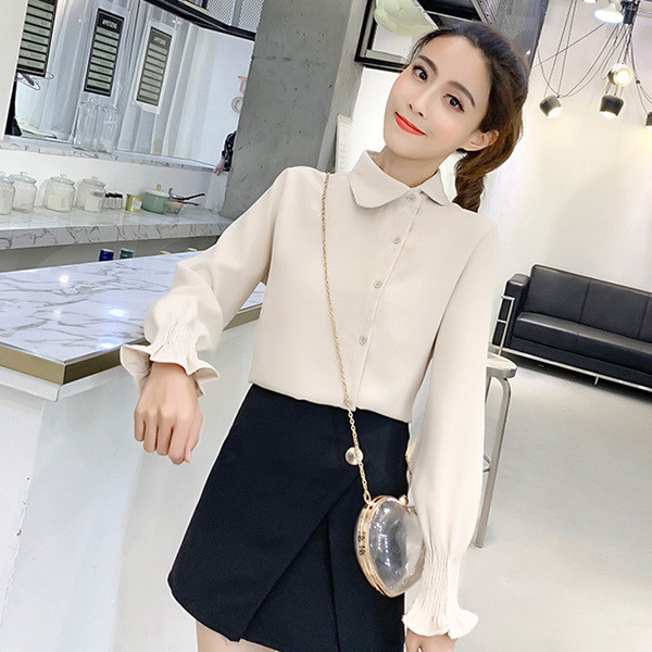 Elegáns női ing oldalsó rögzítéssel, kék és fehér színben