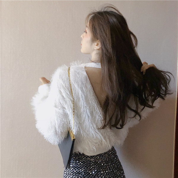 Aktuális női pehelyblúz nyitott háttal, két színben