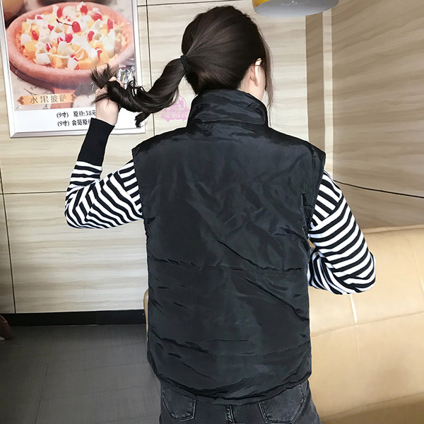 Mindennapi női mellény fekete és rózsaszín színben