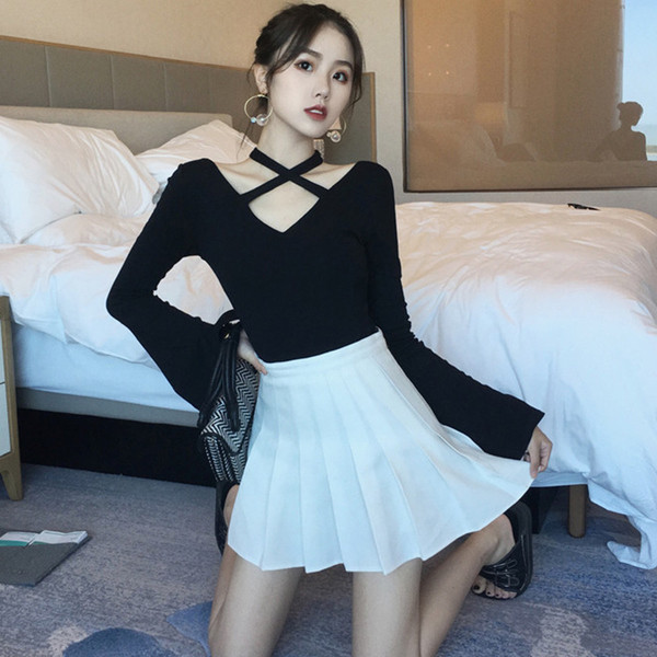 Bluză de damă modernă cu bretele încrucișate și mâneci largi în două culori