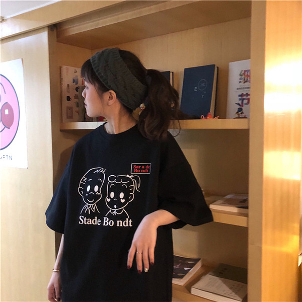 Női alkalmi póló fekete-fehér színben