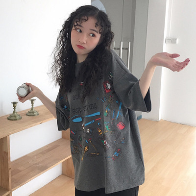 Alkalmi női póló applikációkkal