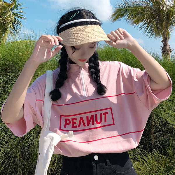 Női alkalmi póló cipzárral és felirattal