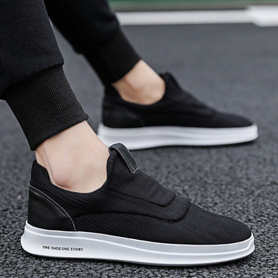 Új, fűző nélküli férfi tornacipő szürke, fekete és fehér színben