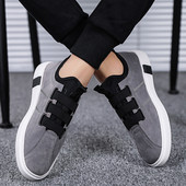 Új férfi cipő fekete és szürke színben, gumival