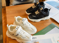 Αθλητικά παιδικά παπούτσια  για αγόρια σε μαύρο και άσπρο χρώμα