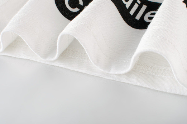 Gyerek felső fiúknak fehér színben, rátéttel