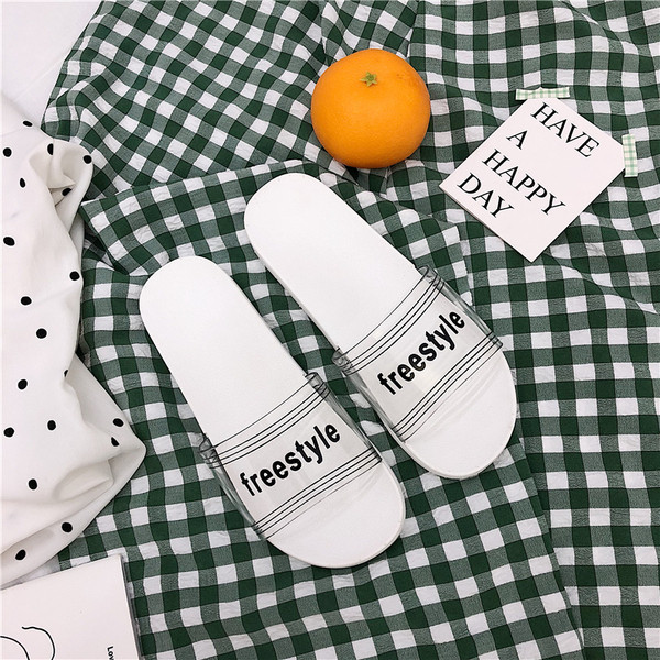 Прозрачни дамски чехли с надпис в черен и бял цвят