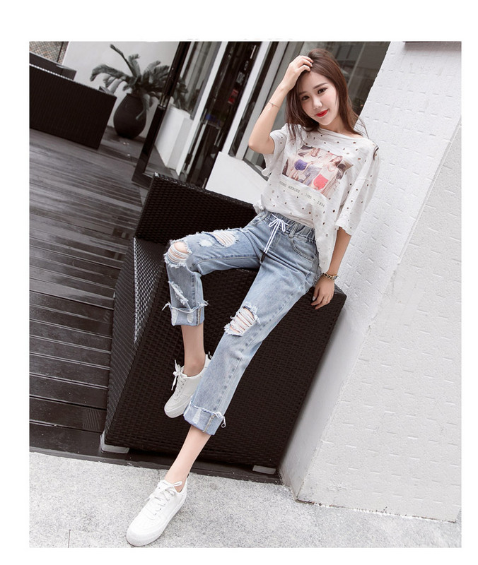 Blugi de dama moderni cu sireturi si motive rupte