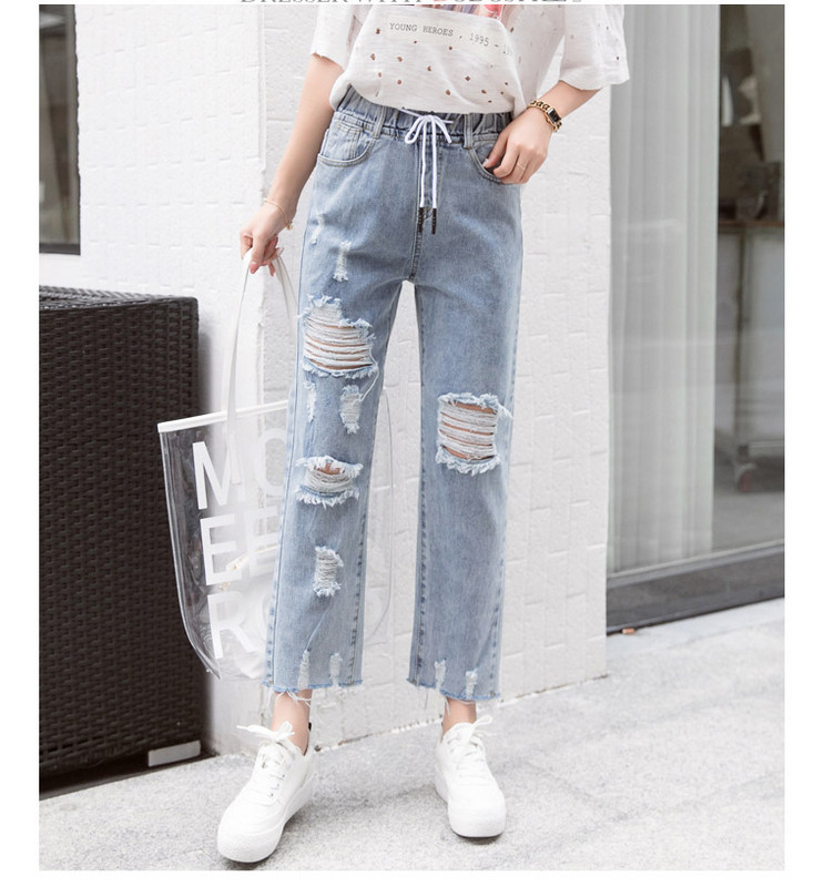 Blugi de dama moderni cu sireturi si motive rupte