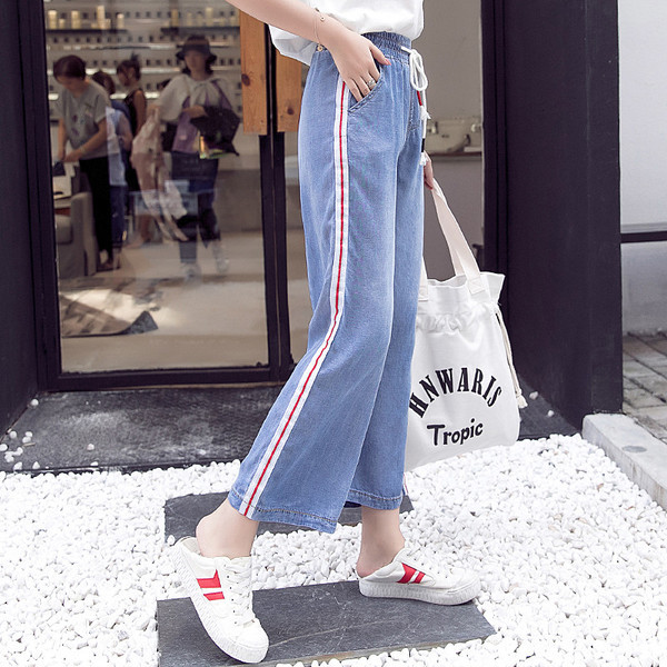 Blugi de dama model lat cu sireturi si margini colorate