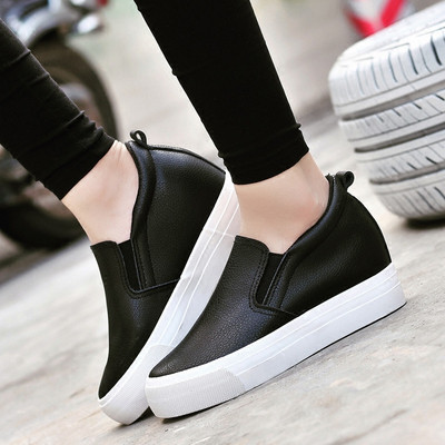 Women`s modern moccasins made of eco leather in black and white