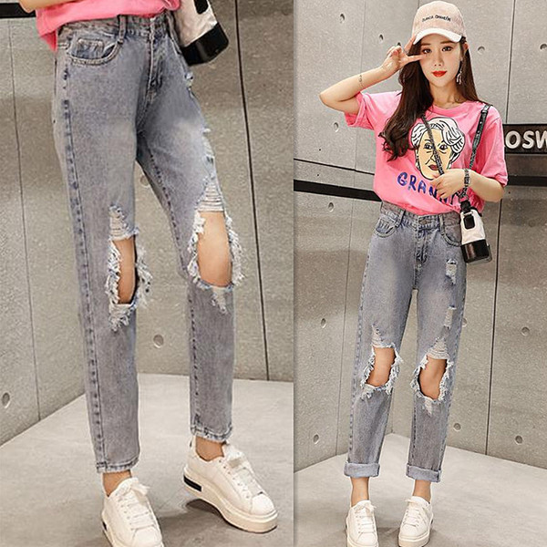 Blugi casual de dama cu motive rupte si talie inalta