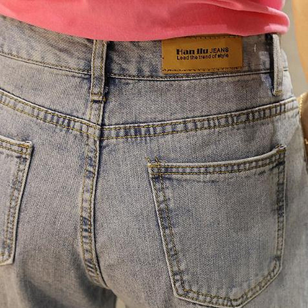 Blugi casual de dama cu motive rupte si talie inalta