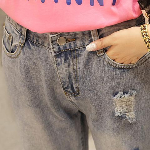 Blugi casual de dama cu motive rupte si talie inalta