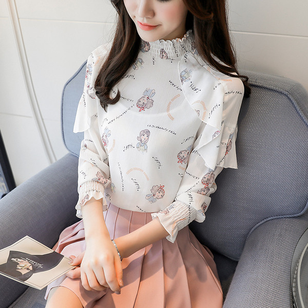 Γυναικεία μπλούζα σε μπλε και λευκό χρώμα με λουλούδια